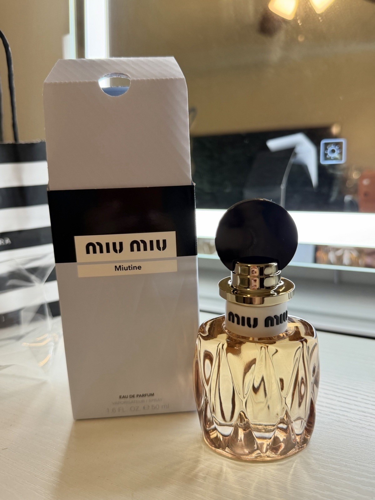 Miu Miu Miutine Eau de Parfum Spray Regular Size 1.6 fl oz MPN 22271XA