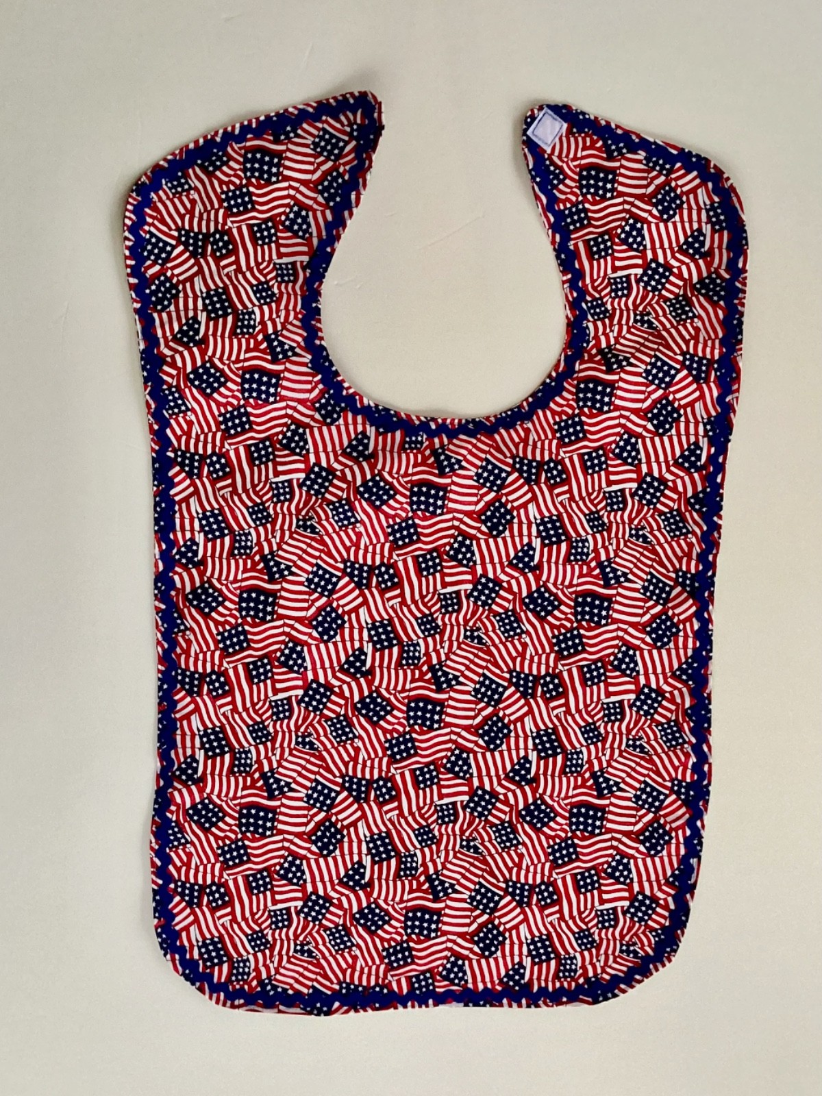 ADULT CLOTHING PROTECTOR/ BIB (UNITED STATES “STARS & STRIPES” FLAGS)