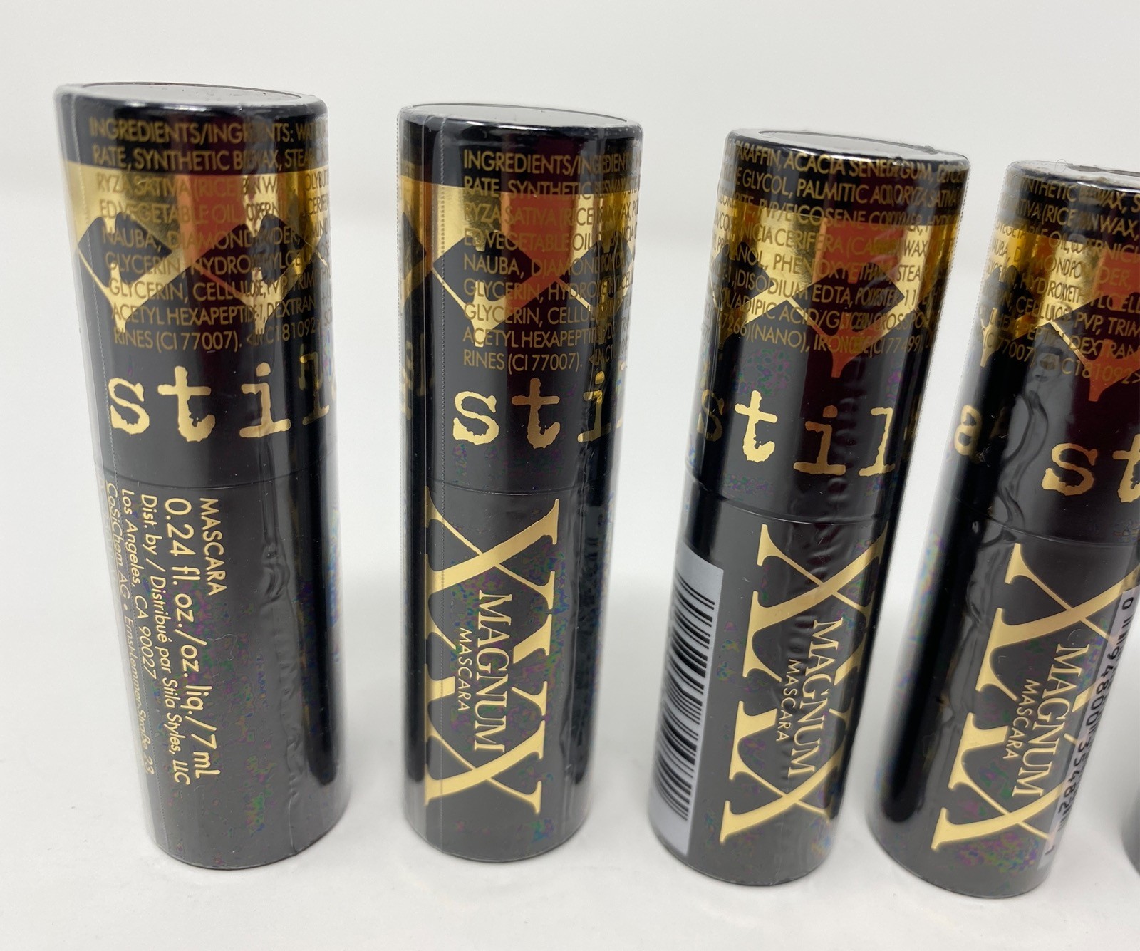 4 STILLA Voluminizing Magnum XXX Black Mascara .24oz ea Travel NEW SEALED